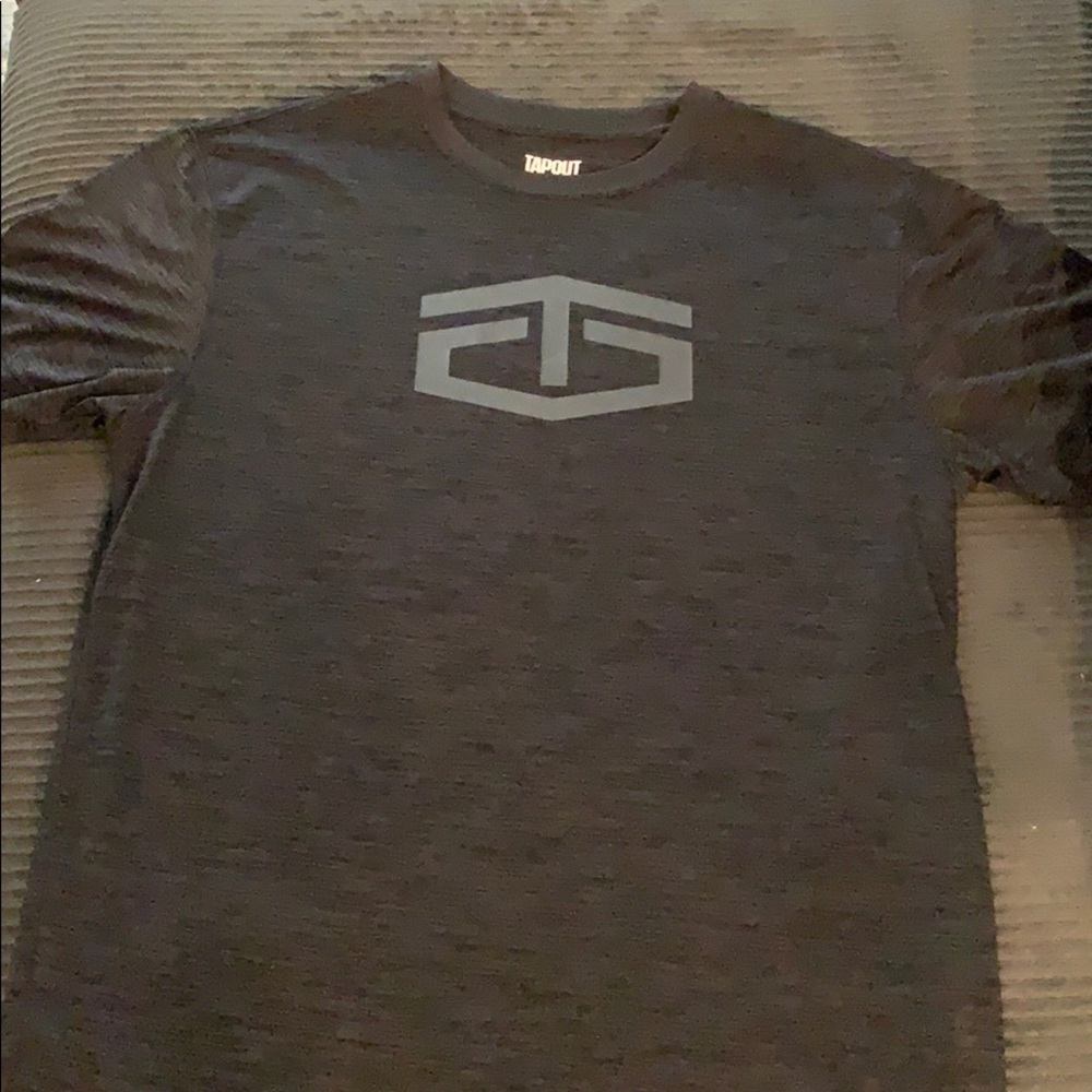 Tap out work out shirt.